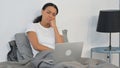 African Woman Sleeping in Bed with Laptop in Lap Royalty Free Stock Photo