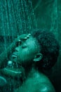 Woman standing under the shower Royalty Free Stock Photo