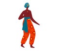 African woman in traditional dress walking confidently. Ethnic fashion and elegant posture. Cultural attire and pride