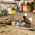 African woman washing clothes