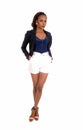 African woman in white shorts. Royalty Free Stock Photo