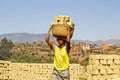 Africans woman working hard in brickyard