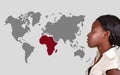 African woman and world map Royalty Free Stock Photo