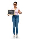 african woman with zero waste words on chalkboard Royalty Free Stock Photo