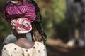 African Women with Colorful Bundles on Heads