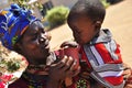 African women feeding child