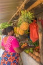 African women at Kenyan fruit and vegetable stand