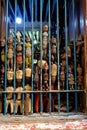 African wood carved dolls in shop window in Stone Town Zanzibar