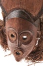 African wooden mask with hair, isolated