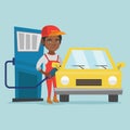 African worker of gas station refueling a car. Royalty Free Stock Photo