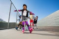 African girl rollerblading with hands like wings Royalty Free Stock Photo