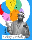 African young man drinking red wine, holding air balloons, celebrating birthday. Creative design. Poster Royalty Free Stock Photo