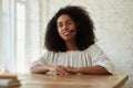 An African young woman is wearing a headset, learning and increasing foreign language skills Royalty Free Stock Photo