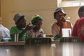 African youths eating in shelter