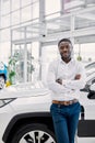 Africanamerican man came to see automobiles in dealership Royalty Free Stock Photo