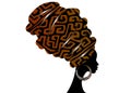 Portrait beautiful African woman in traditional turban, Kente head wrap. Mali Bogolan mud cloth, ethnic dashiki printing, isolated Royalty Free Stock Photo