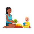 Afro American babysitter playing with baby boy Royalty Free Stock Photo