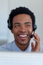 Afro-American businessman in a call center