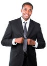 Afro-American businessman correcting a tie Royalty Free Stock Photo