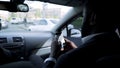 Afro-American businessman going to meeting, looking through questions on phone Royalty Free Stock Photo