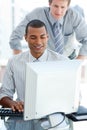 Afro-american businessman working at a computer Royalty Free Stock Photo