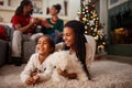 Afro-American child for Christmas eve with family at home Royalty Free Stock Photo