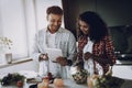 Afro American Couple Cooking At Kitchen Concept. Royalty Free Stock Photo