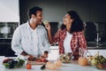 Afro American Couple Cooking At Kitchen Concept. Royalty Free Stock Photo