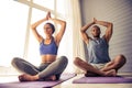 Afro American couple doing yoga Royalty Free Stock Photo