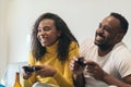 Afro-american couple enjoying playing video game at home. having fun Royalty Free Stock Photo