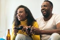 Afro-american couple enjoying playing video game at home. having fun Royalty Free Stock Photo