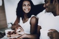 Afro American Couple Having A Dinner In Bedroom.