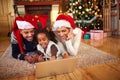 Afro American family use laptop for Christmas shopping online Royalty Free Stock Photo