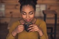 Afro American girl in cafe Royalty Free Stock Photo