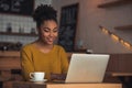 Afro American girl in cafe Royalty Free Stock Photo