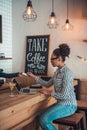 Afro American girl in cafe Royalty Free Stock Photo