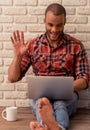 Afro American man with gadget Royalty Free Stock Photo