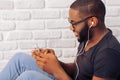 Afro American man with gadget Royalty Free Stock Photo