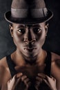 Afro-american man in hat and suspenders Royalty Free Stock Photo