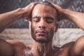 Afro American man taking shower Royalty Free Stock Photo