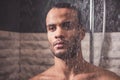 Afro American man taking shower Royalty Free Stock Photo