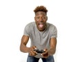 Afro american man using remote controller playing video game ha Royalty Free Stock Photo