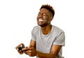 Afro american man using remote controller playing video game ha Royalty Free Stock Photo