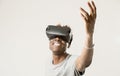 Afro american man wearing virtual reality vr 360 vision goggles enjoying video game Royalty Free Stock Photo