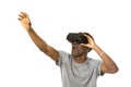 Afro american man wearing virtual reality vr 360 vision goggles enjoying video game Royalty Free Stock Photo