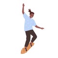 Afro-American skateboarder performing trick on skateboard. Young skater standing on long board. Trendy outdoor activity