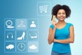 Afro american woman with credit card and icons Royalty Free Stock Photo