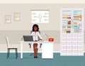 Afro american woman doctor in uniform sitting in doctors office. Medical consulting room interior with table