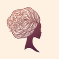 Afro - American woman face. Beauty salon logo.