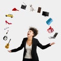 Afro-American woman juggling objects Royalty Free Stock Photo